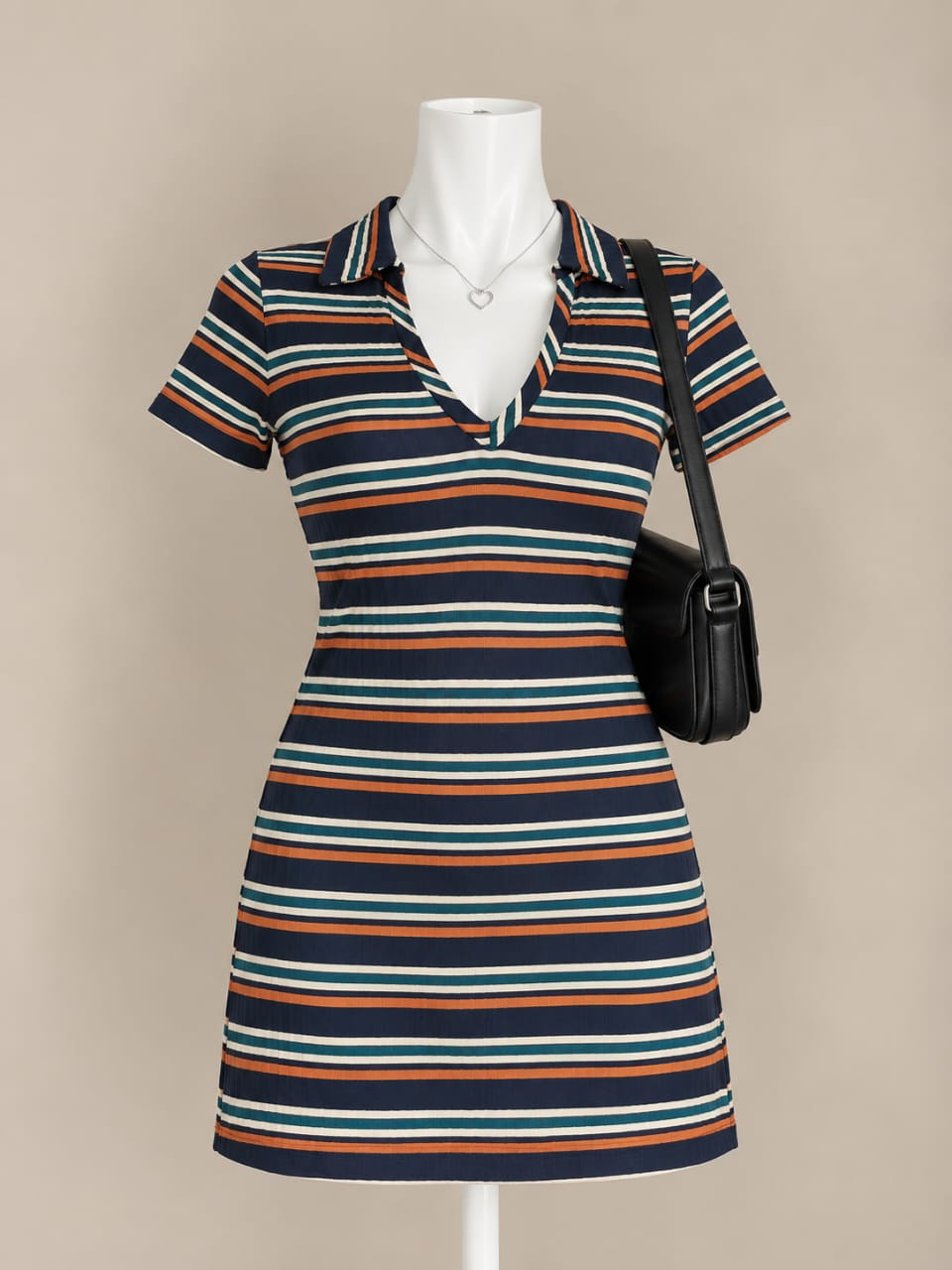 Navy dress with orange, white and teal stripes and a V-neck collar