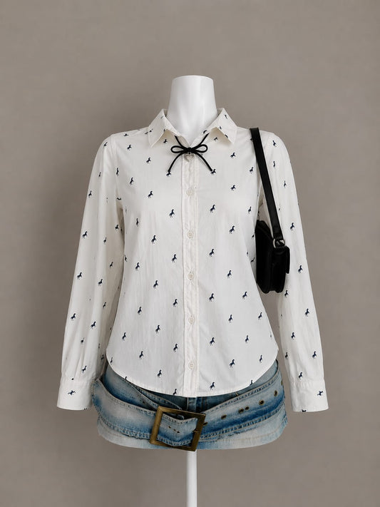 White horse print fitted button-down shirt styled on mannequin