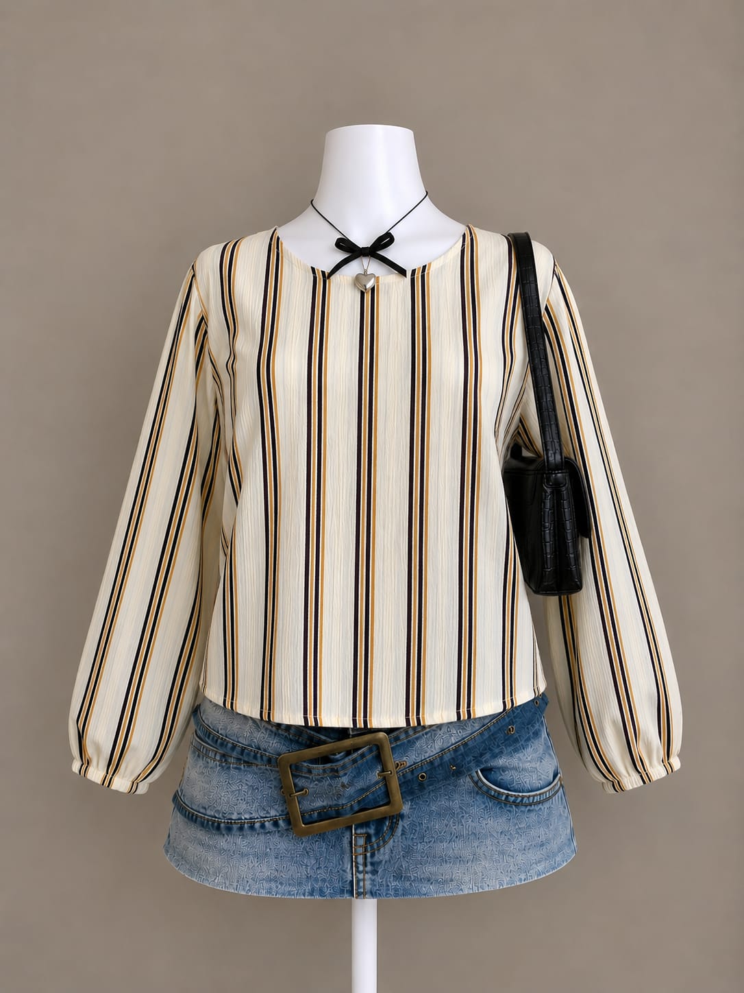 Cream and mustard stripe balloon sleeve blouse styled on mannequin