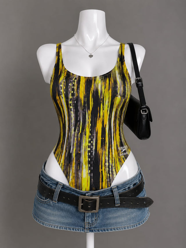 Yellow and black abstract brushstroke print bodysuit with scoop neck on mannequin
