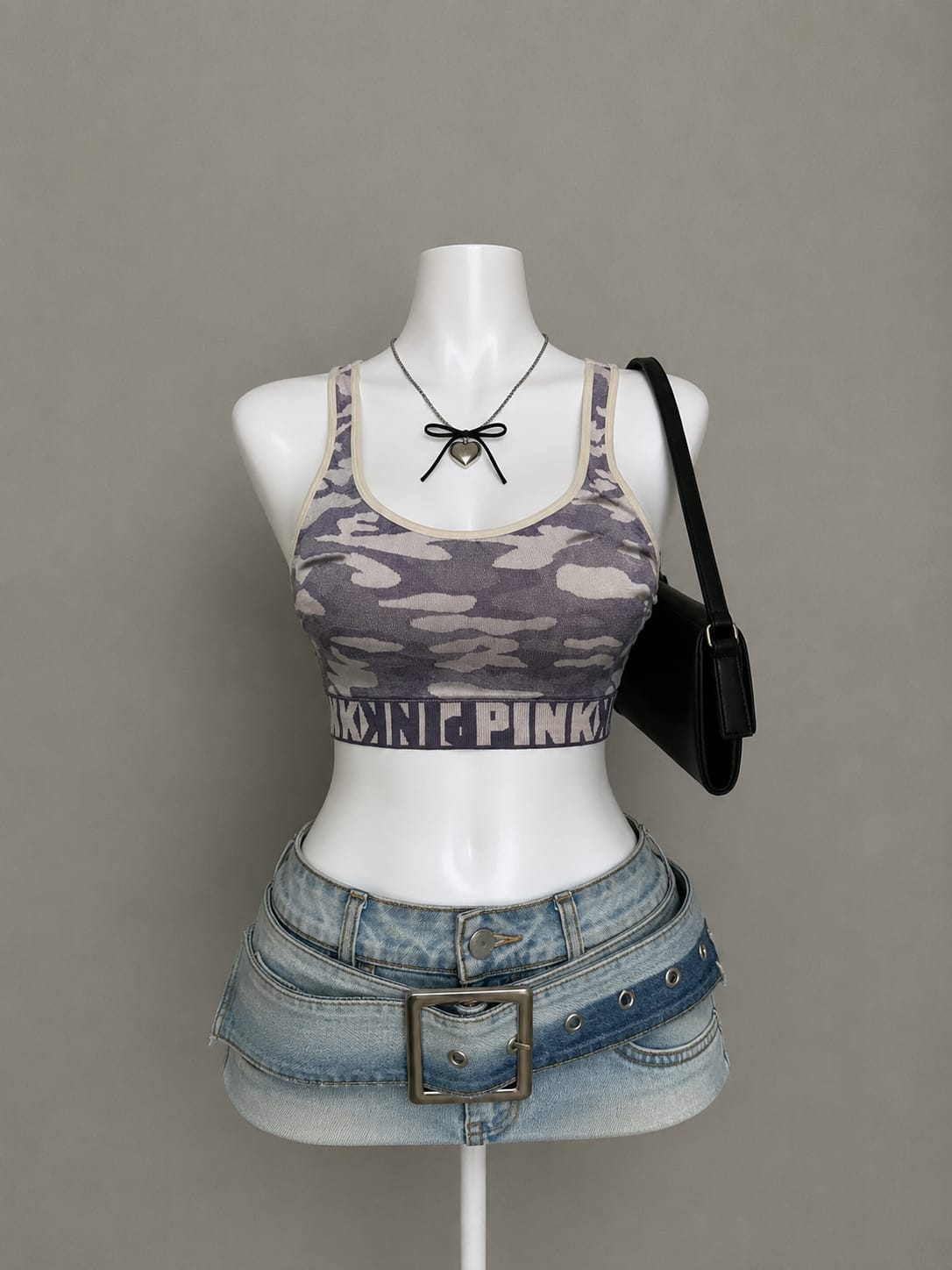 Grey camo print crop top - front view on mannequin