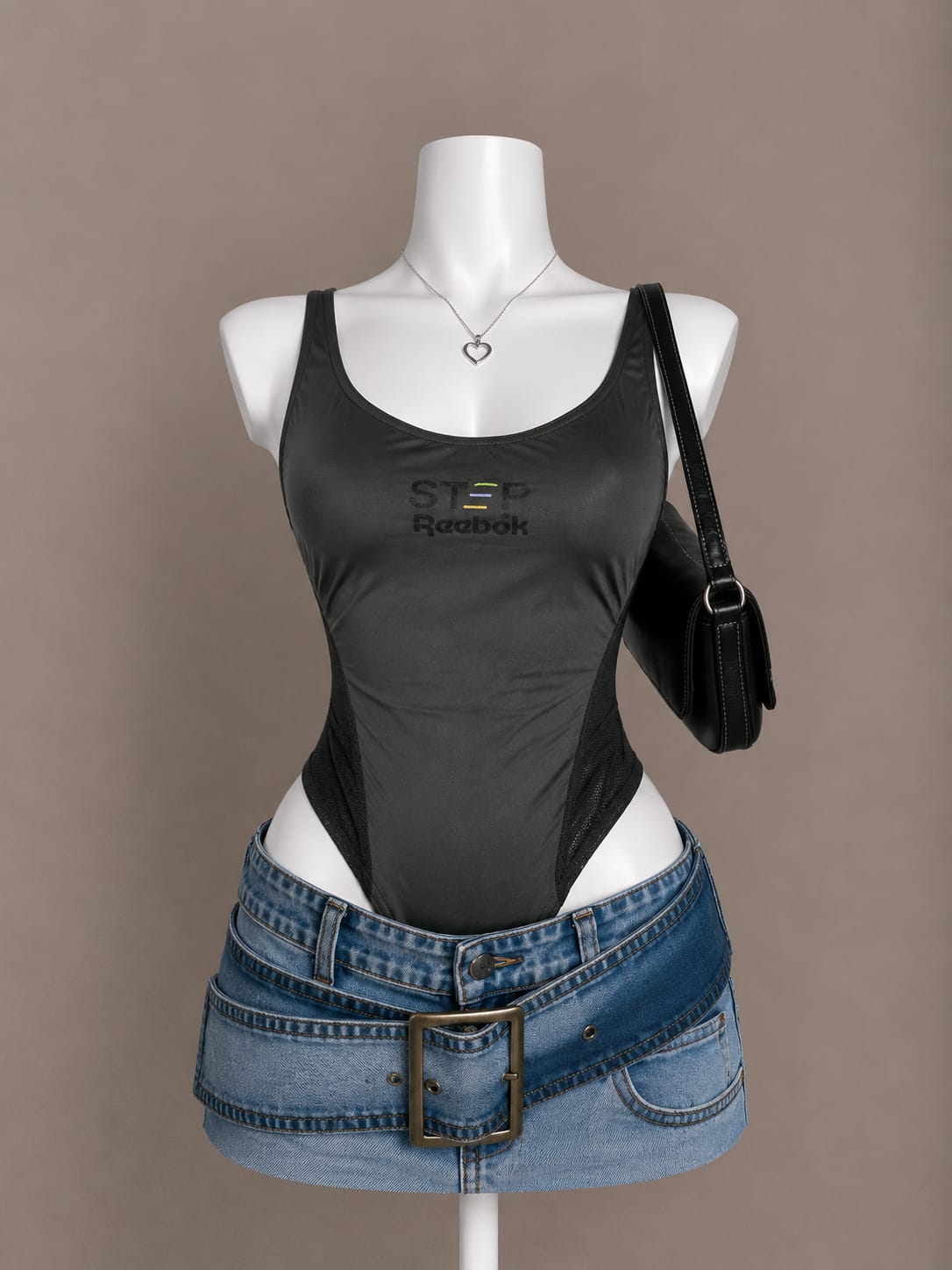Charcoal graphic print sleeveless bodysuit on mannequin