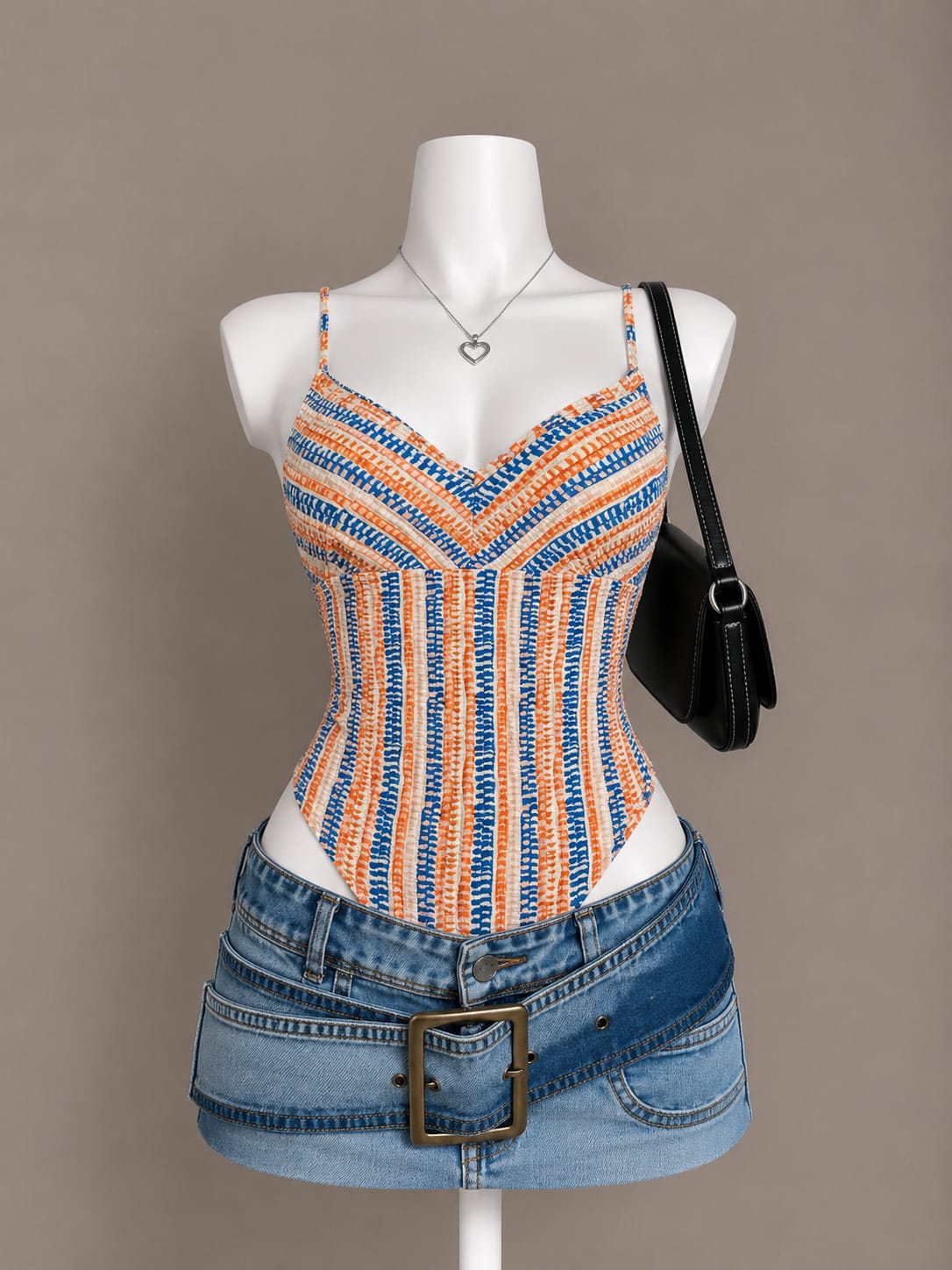 Orange and blue crochet stripe spaghetti strap bodysuit on mannequin
