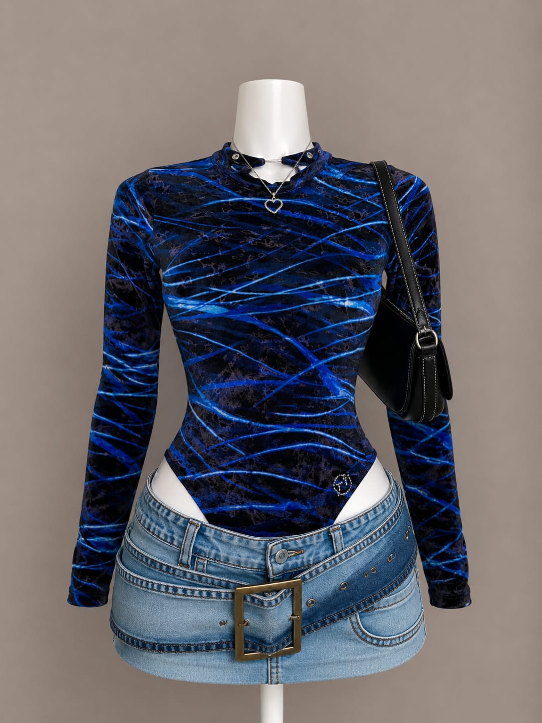 Blue velvet lightning print long sleeve bodysuit on mannequin