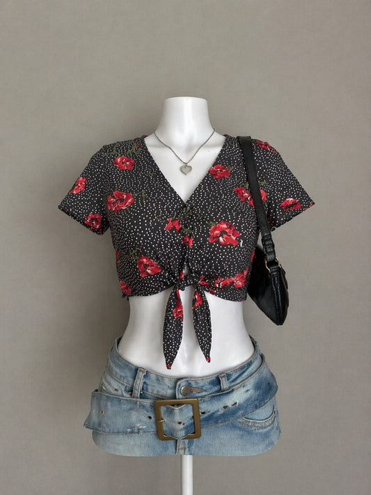 Black red floral tie front crop top on mannequin