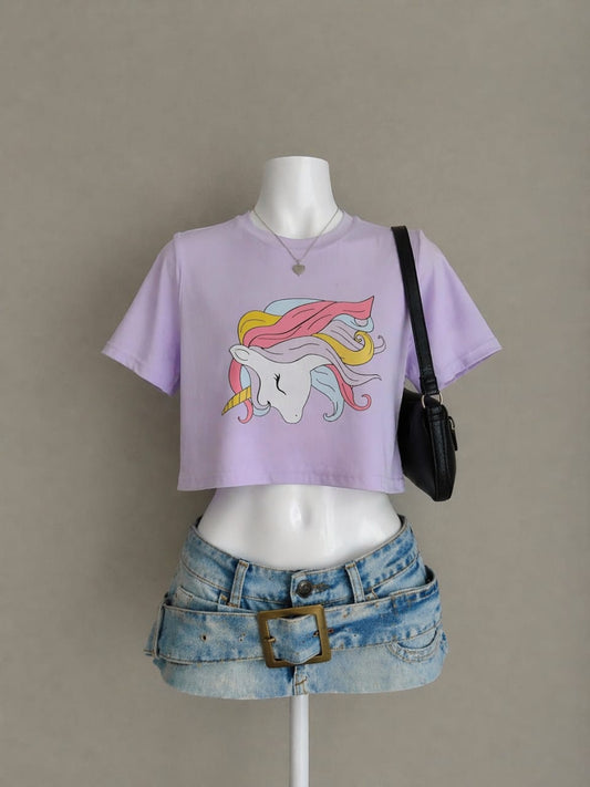 Lavender unicorn graphic crop tee on mannequin
