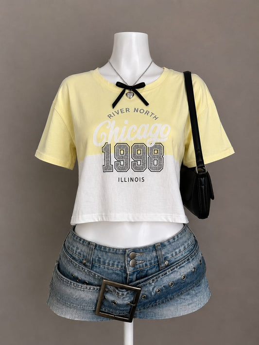 Yellow Chicago crop tee on mannequin