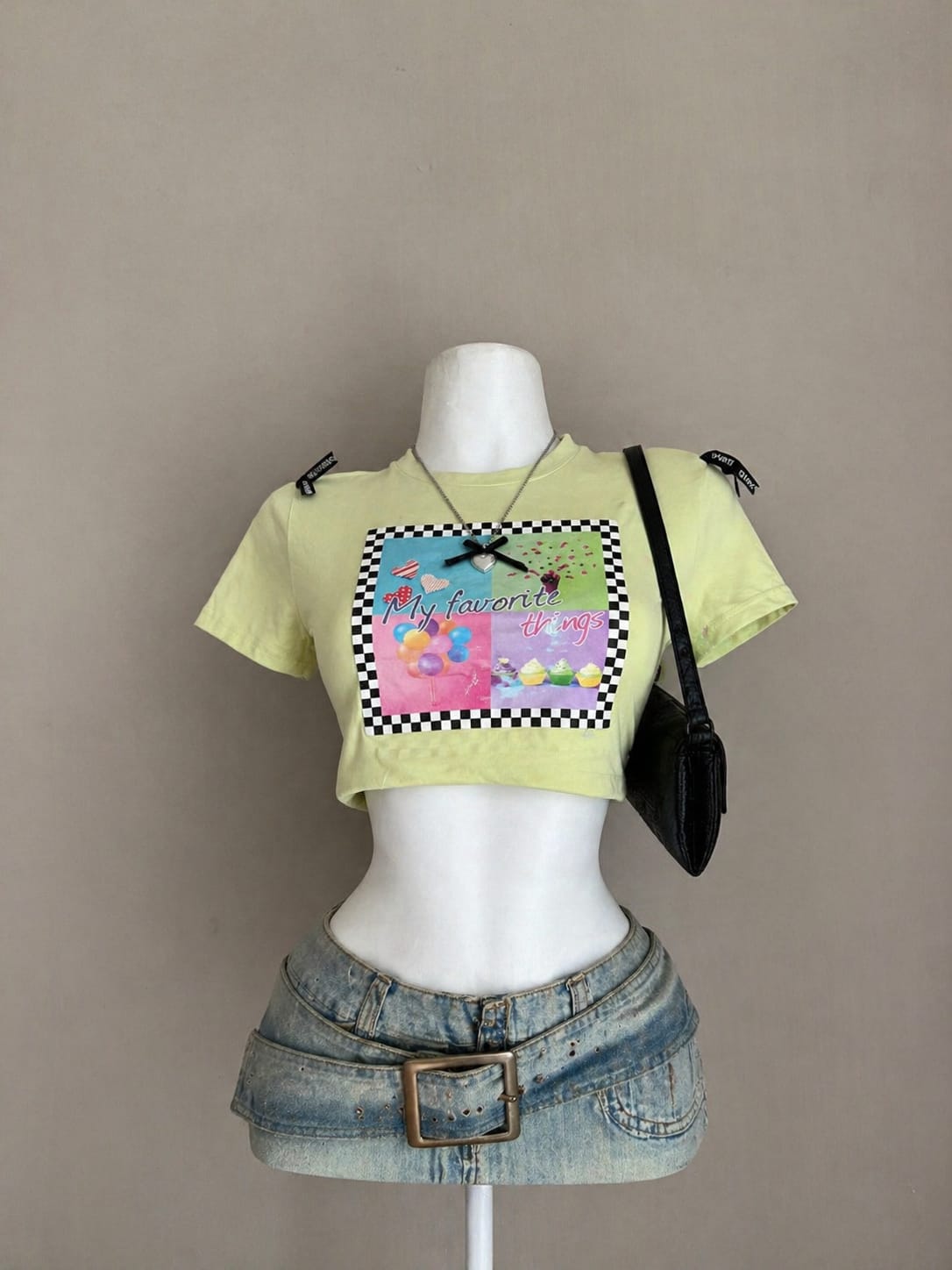 Yellow Favorite Things graphic crop tee on mannequin
